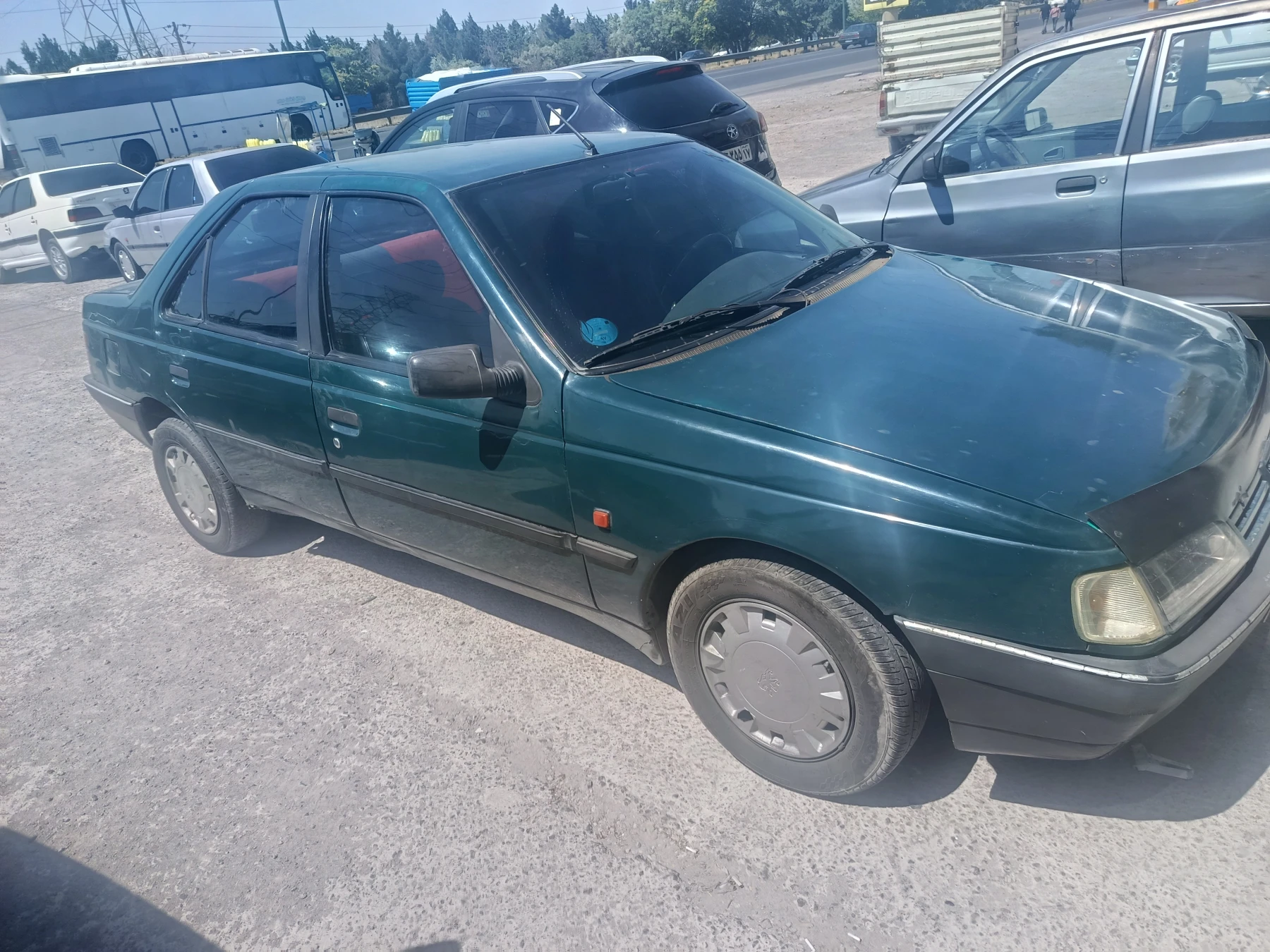 پژو روآ مدل 85 دور رنگ - جلو